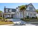 Beautiful two-story home with attached garage, lovely landscaping, and a welcoming front porch at 6105 Bolsena Place, Myrtle Beach, SC 29577