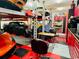 Well-equipped garage with multiple car lifts, tool storage, and ample space for automotive projects and storage at 6105 Bolsena Place, Myrtle Beach, SC 29577