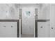 Modern tile accents this walk in shower with dual shower heads and glass enclosures at 6105 Bolsena Place, Myrtle Beach, SC 29577
