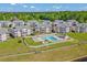 Aerial view of community pool, clubhouse, and buildings at 640 Waterway Village Blvd # 15 I, Myrtle Beach, SC 29579