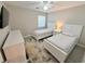 Well-lit bedroom featuring two twin beds and a large TV at 640 Waterway Village Blvd # 15 I, Myrtle Beach, SC 29579