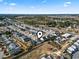 Wide aerial view of a residential area with lush landscaping and recreational vehicle storage at 724 Hobonny Loop, Longs, SC 29568