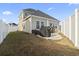 Backyard featuring a patio space with furniture, a grill, and a privacy fence at 724 Hobonny Loop, Longs, SC 29568