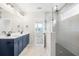 Bathroom with double vanity, marble floors, and a walk-in shower at 1017 Tarpon Pond Rd., North Myrtle Beach, SC 29582