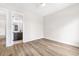 Spacious bedroom with hardwood floors and a ceiling fan at 1017 Tarpon Pond Rd., North Myrtle Beach, SC 29582