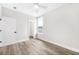Well-lit bedroom with hardwood floors and access to a closet at 1017 Tarpon Pond Rd., North Myrtle Beach, SC 29582