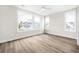 Bright bedroom with hardwood floors and multiple windows at 1017 Tarpon Pond Rd., North Myrtle Beach, SC 29582