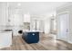 Modern kitchen with white and blue cabinetry and large island at 1017 Tarpon Pond Rd., North Myrtle Beach, SC 29582