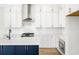 Modern kitchen with white cabinets, quartz countertops, and a large island at 1017 Tarpon Pond Rd., North Myrtle Beach, SC 29582