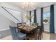 A beautifully decorated dining room featuring a stylish table setting and modern lighting fixture at 561 Slaty Dr., Myrtle Beach, SC 29588