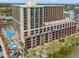 Spacious condominium complex featuring outdoor pools, balconies, and well-manicured grounds at 6900 N Ocean Blvd. # 1135, Myrtle Beach, SC 29572