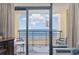 Balcony with sliding glass doors offering ocean view at 6900 N Ocean Blvd. # 1135, Myrtle Beach, SC 29572