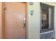 Unit 1135 featuring coded door entry with window and air conditioner at 6900 N Ocean Blvd. # 1135, Myrtle Beach, SC 29572