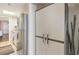 Modern kitchen with stainless steel appliances and white cabinetry, open to the other rooms at 6900 N Ocean Blvd. # 1135, Myrtle Beach, SC 29572