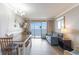 Relaxing living room with ocean view and dining area at 6900 N Ocean Blvd. # 1135, Myrtle Beach, SC 29572