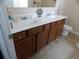 Bright bathroom featuring a double vanity with white countertops and and sinks at 741 Londonberry Ct., Conway, SC 29526