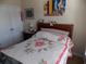 Comfortable bedroom with a floral-patterned bedspread and ample natural light at 741 Londonberry Ct., Conway, SC 29526