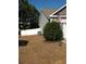 Well-maintained front yard featuring lush greenery and a tidy lawn at 741 Londonberry Ct., Conway, SC 29526