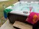 Luxurious hot tub with crystal-clear water and plush towels nearby at 741 Londonberry Ct., Conway, SC 29526