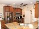 Modern kitchen featuring stainless steel appliances, granite countertops, and ample cabinet space at 741 Londonberry Ct., Conway, SC 29526