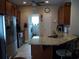 Charming kitchen featuring granite countertops and stainless steel appliances. Washer and dryer shown as well at 741 Londonberry Ct., Conway, SC 29526