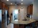 Well-equipped kitchen with stainless steel appliances, granite countertops, and a convenient breakfast bar at 741 Londonberry Ct., Conway, SC 29526