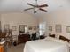 Comfortable main bedroom with a ceiling fan, ample natural light, and neutral decor at 741 Londonberry Ct., Conway, SC 29526