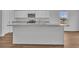Stylish kitchen island featuring granite countertops, stainless steel sink and ample space for food preparation at 1514 Clubstone Dr., Conway, SC 29526