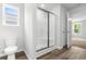 Bathroom featuring a glass-enclosed shower, modern fixtures, and a view to another room at 1518 Clubstone Dr., Conway, SC 29526