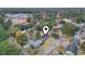 An aerial view of the home pinpointing its location near a school in a residential neighborhood at 1673 Middleton St., Georgetown, SC 29440