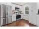 Stylish kitchen featuring modern stainless steel appliances, granite countertops, and ample storage at 1673 Middleton St., Georgetown, SC 29440