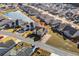 Aerial view of a home in a neighborhood with a pond, offering a serene setting at 1711 Sapphire Dr., Longs, SC 29568