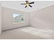 Bedroom with carpet, tray ceilings, ceiling fan, and natural light from the window at 1711 Sapphire Dr., Longs, SC 29568