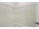 Walk-in closet with wire shelving and neutral carpet at 1711 Sapphire Dr., Longs, SC 29568