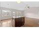 Kitchen island with granite countertop, in an open concept kitchen and dining area at 1711 Sapphire Dr., Longs, SC 29568