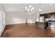 Spacious living room, open concept design, and kitchen with island at 1711 Sapphire Dr., Longs, SC 29568