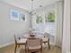 Bright dining area with natural light, a round table, and modern decor at 2400 Hillbourne Loop, North Myrtle Beach, SC 29582