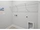 A minimalist laundry room with gray walls and shelving at 2400 Hillbourne Loop, North Myrtle Beach, SC 29582