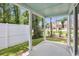 Covered patio features a painted ceiling, views of the backyard and privacy fence at 2400 Hillbourne Loop, North Myrtle Beach, SC 29582