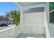 Balcony with white railings, offering views of the surrounding neighborhood at 2624 Hillbourne Loop, North Myrtle Beach, SC 29582