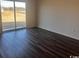 Bedroom featuring luxury vinyl flooring, a sliding glass door and serene outdoor views at 677 Castillo Dr., Loris, SC 29569