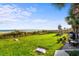 Expansive grassy lawn with cornhole and lounge chairs at 6804 N Ocean Blvd. # 723, Myrtle Beach, SC 29572