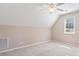 Bedroom featuring neutral colored walls, carpet, pitched ceilings, and a window letting in plenty of natural light at 765 Ashley Manor Dr., Longs, SC 29568