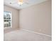 Bedroom with carpet, neutral paint, a ceiling fan, and large window for plenty of natural light at 765 Ashley Manor Dr., Longs, SC 29568