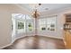 Dining area boasting large windows and wood floors at 765 Ashley Manor Dr., Longs, SC 29568