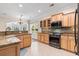 Bright kitchen featuring granite countertops, stainless steel appliances, and tile backsplash at 765 Ashley Manor Dr., Longs, SC 29568