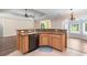 Open-concept kitchen featuring granite counters, stainless appliances and eat-in bar top at 765 Ashley Manor Dr., Longs, SC 29568