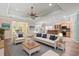 Spacious living room with comfortable seating, wood floors and an open floor plan at 765 Ashley Manor Dr., Longs, SC 29568