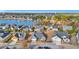 Stunning aerial view of a lakefront community showcasing well-manicured lawns and beautiful homes at 1139 Parish Way, Myrtle Beach, SC 29577