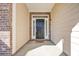 Close-up of a home's welcoming front door with decorative sidelights and a 'Home Sweet Home' doormat at 1139 Parish Way, Myrtle Beach, SC 29577